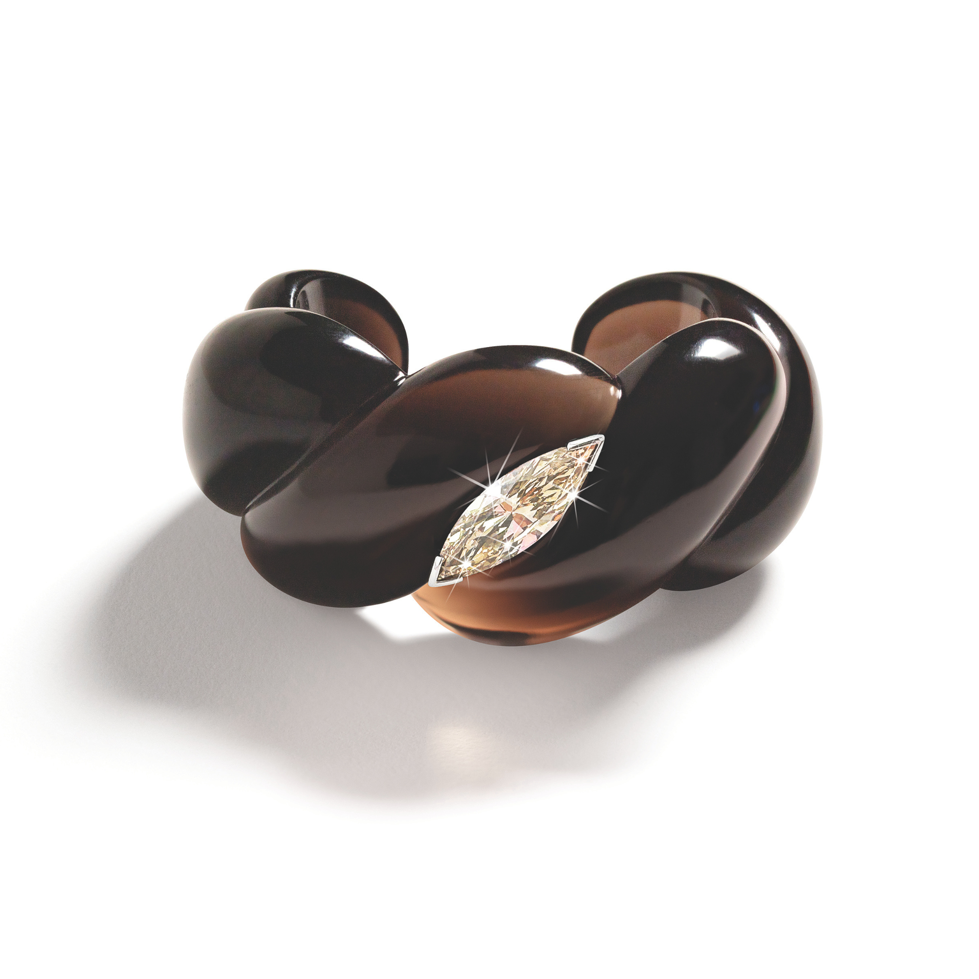 Belperron Torsade Cuff with a 5.55 carat fancy yellow-brown marquise diamond, carved smoky quartz, and platinum